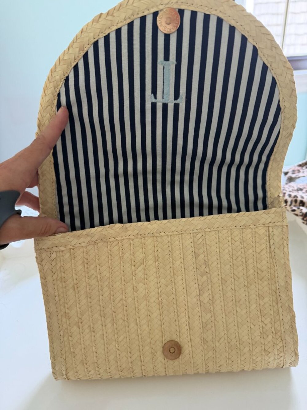 Straw Clutch With "T" Embroidered in Pale Blue Thread